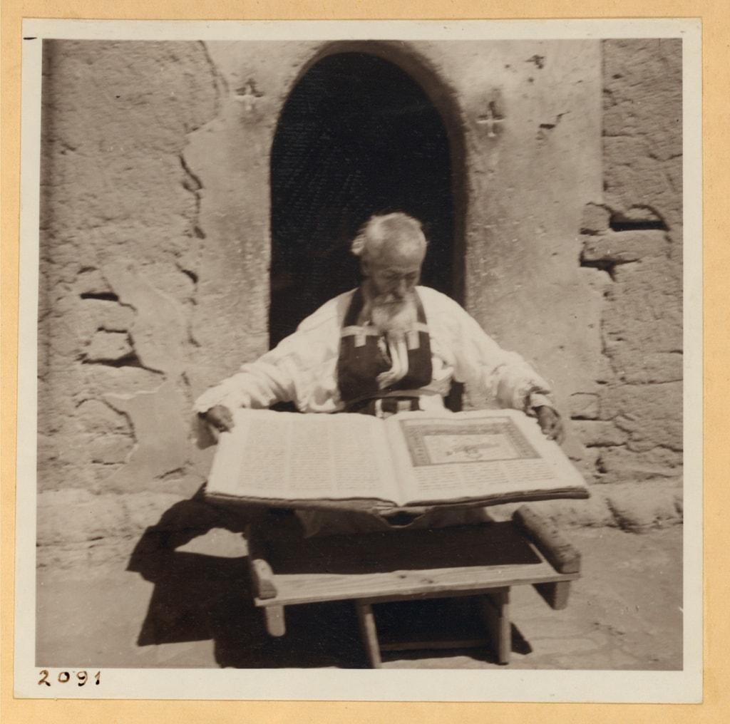 Assyrian priest with his manuscript Bible at Tel Tamer, 1938