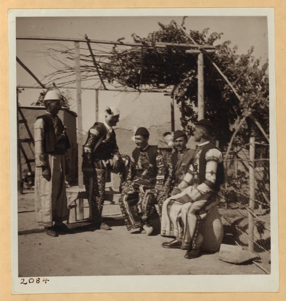 Group of Assyrian men in traditional dress at Tel Tamer, 1938