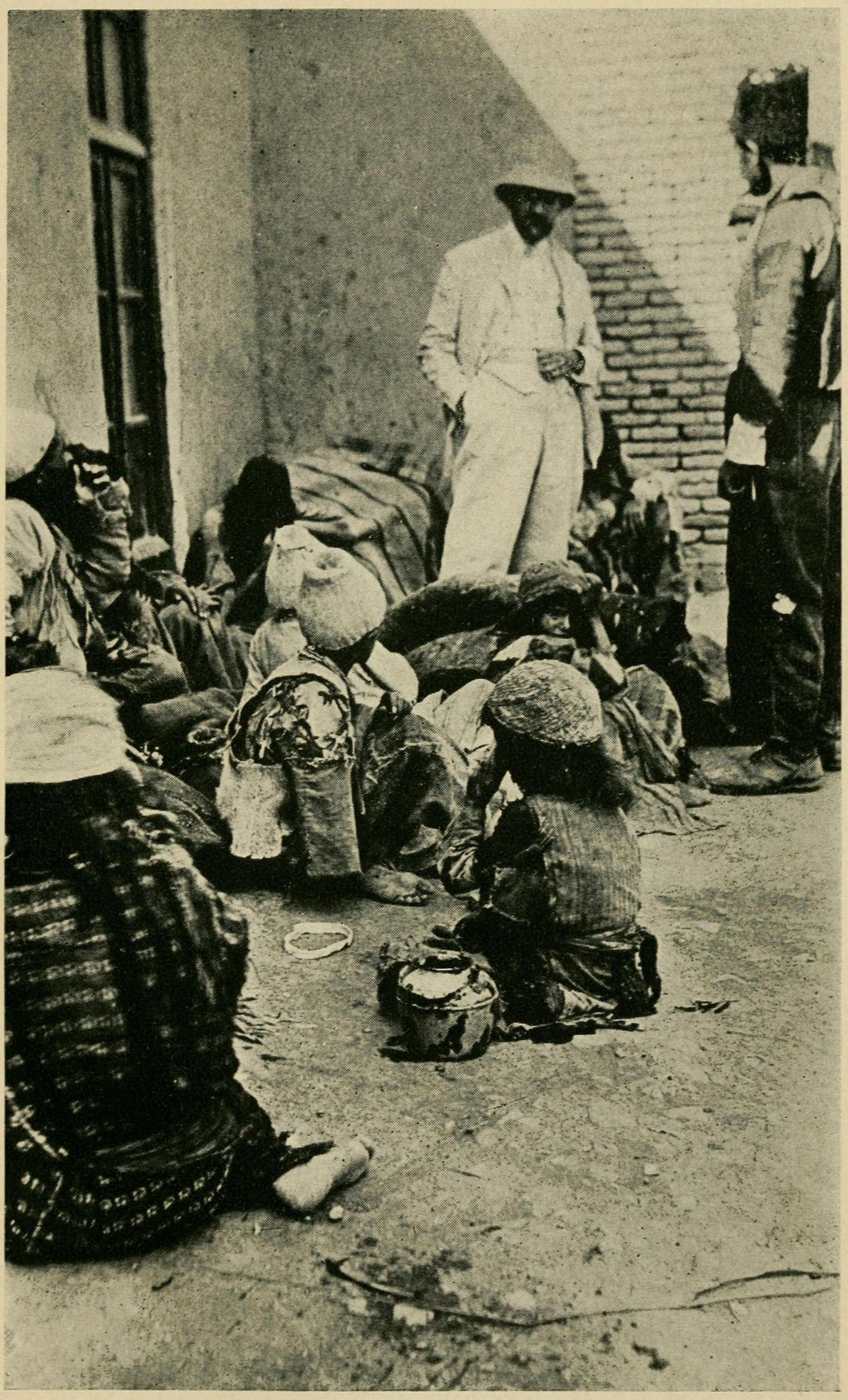 Dr. Shedd with refugees in the city compound, Urmia, 1918