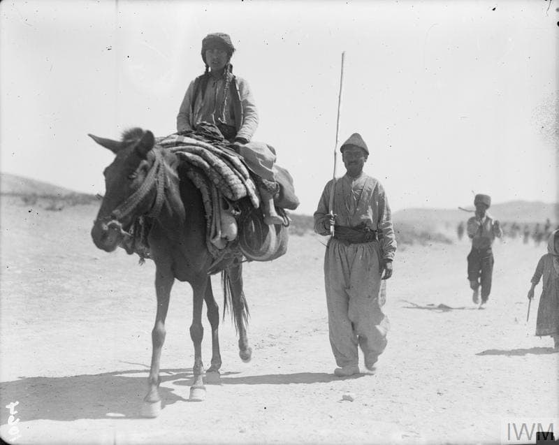 Jilu Assyrian refugees with a laden mule, 1918