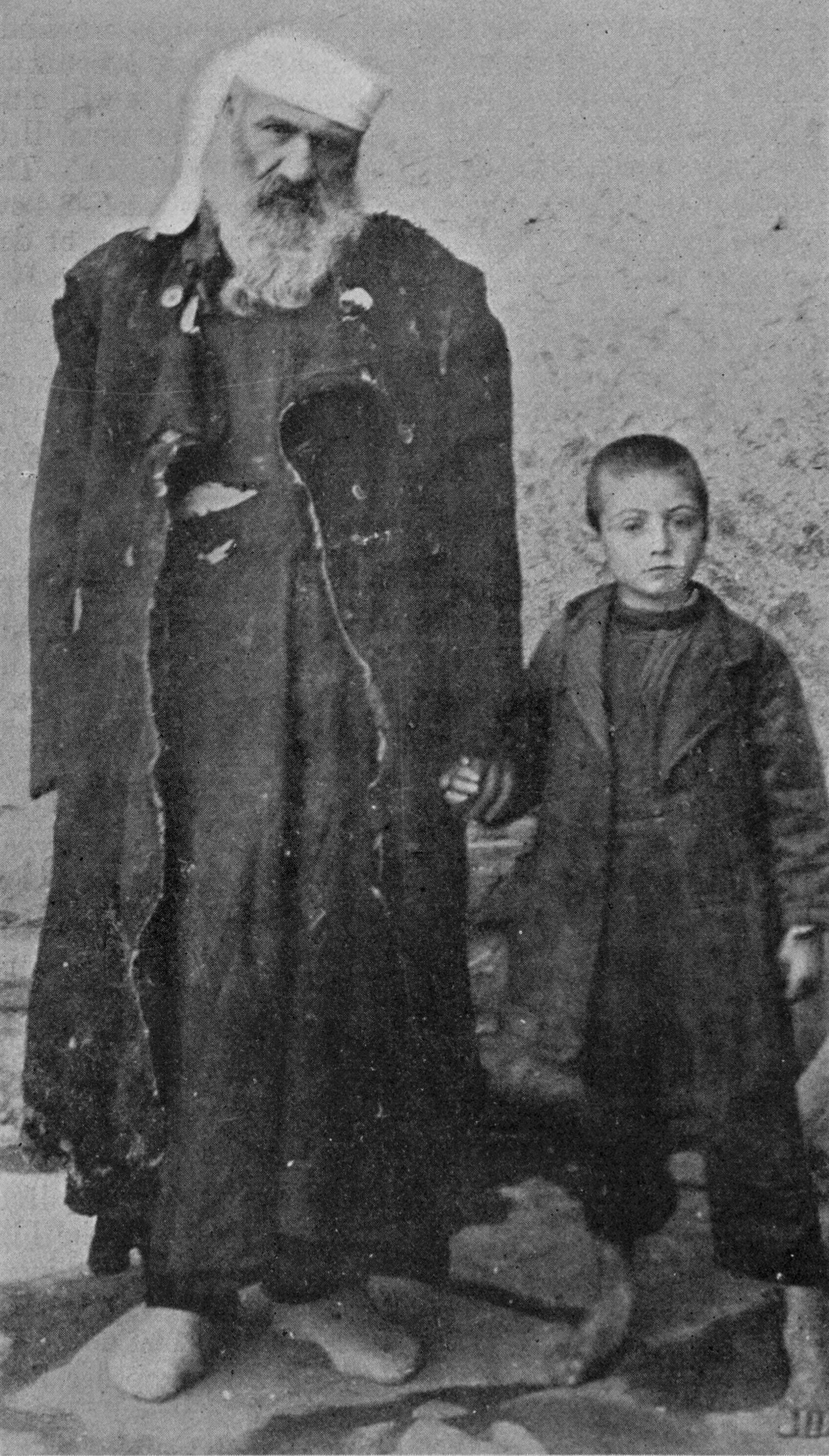 A refugee archdeacon and a boy, 1916