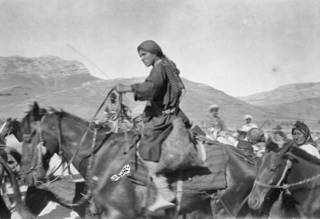 Urmia refugees on horseback trekking through Bijar, 1918