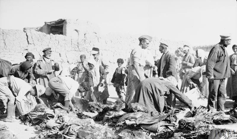 Jilu Assyrian refugees sorting clothing, 1918