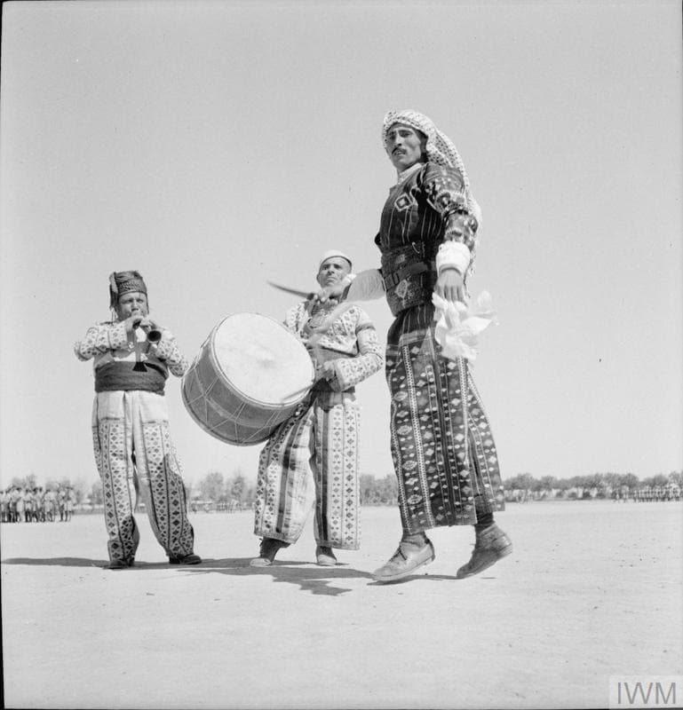 Assyrian dancer and musicians performing the khigga, 1942
