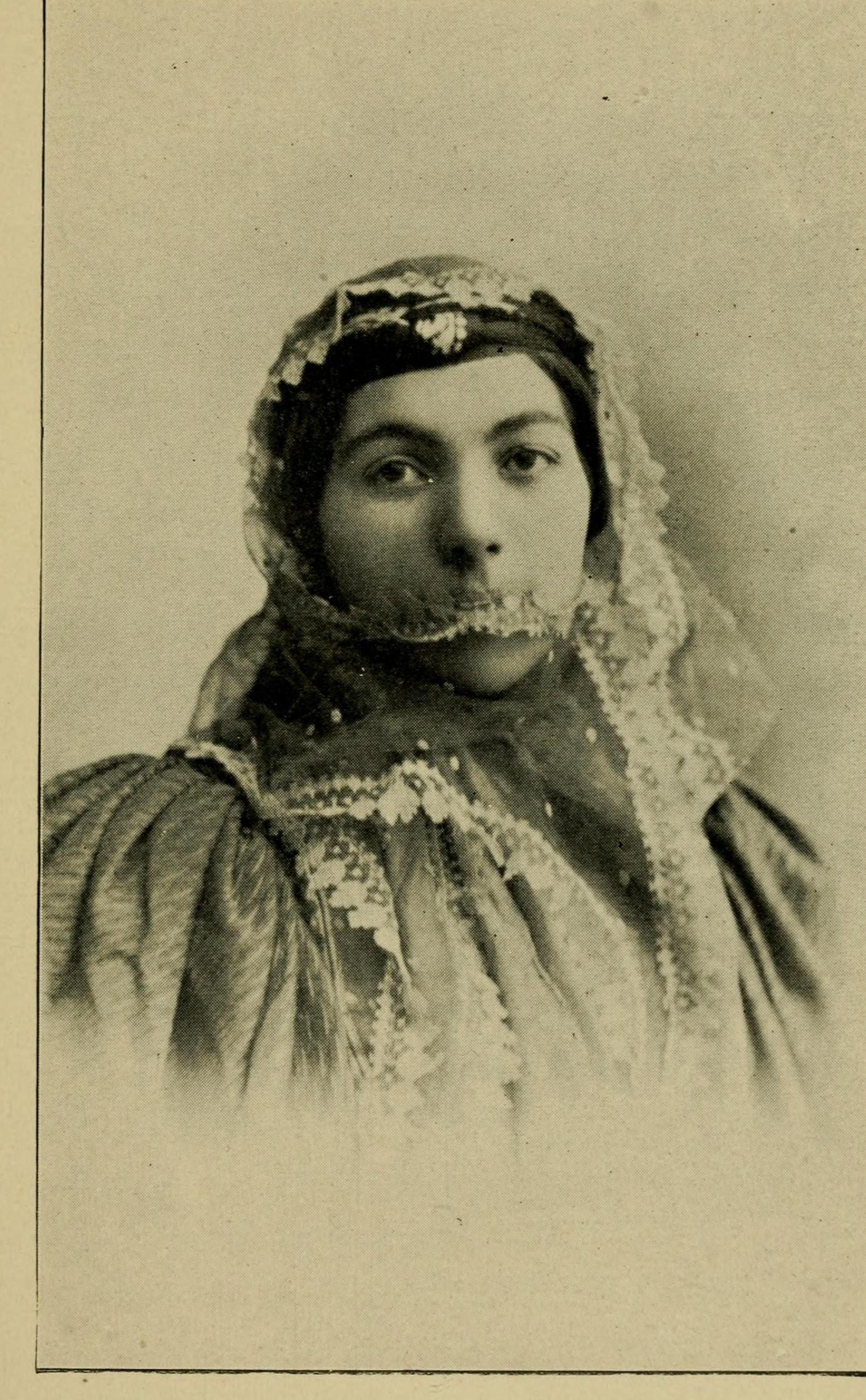 Mrs. Yonan in the headdress of well-to-do Urmia Nestorians