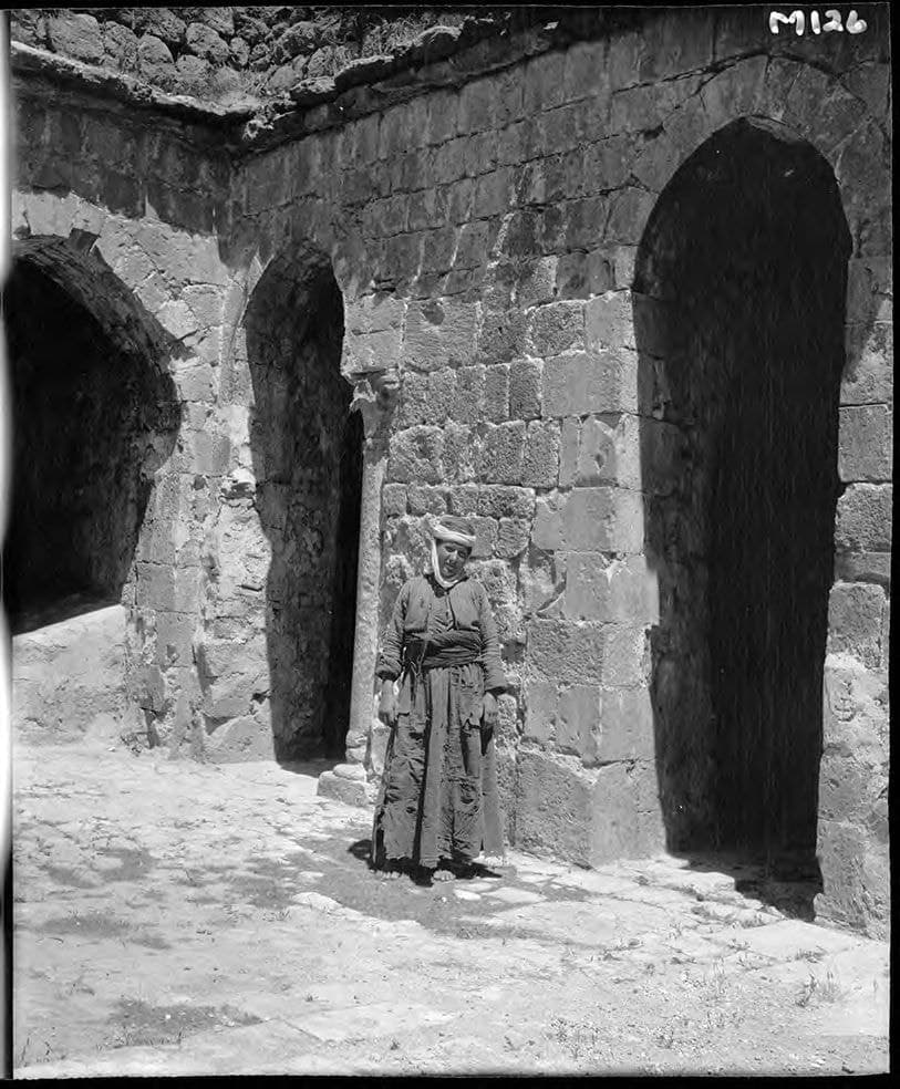 Woman in the cloister of Mor Awgin monastery, 1909
