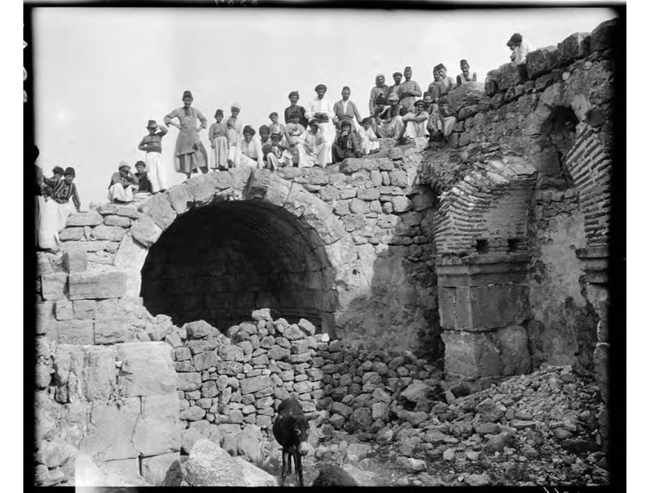 Villagers in the ruined church of Mor Philoxenos, Midyat, 1909