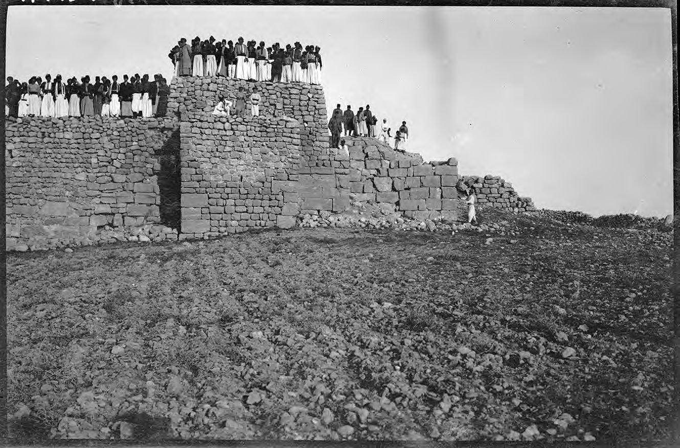 Townspeople on the walls of the church of Mor Philoxenos, Midyat, 1911