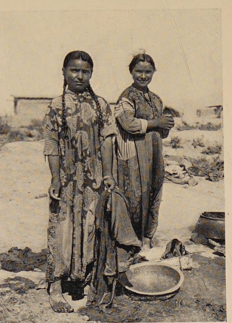 Two Assyrian women standing at Baqubah