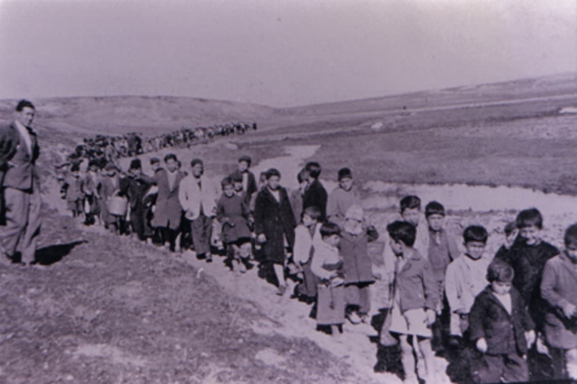 Pupils walk away after the closure of the Syriac schools of Qamishli, 1946