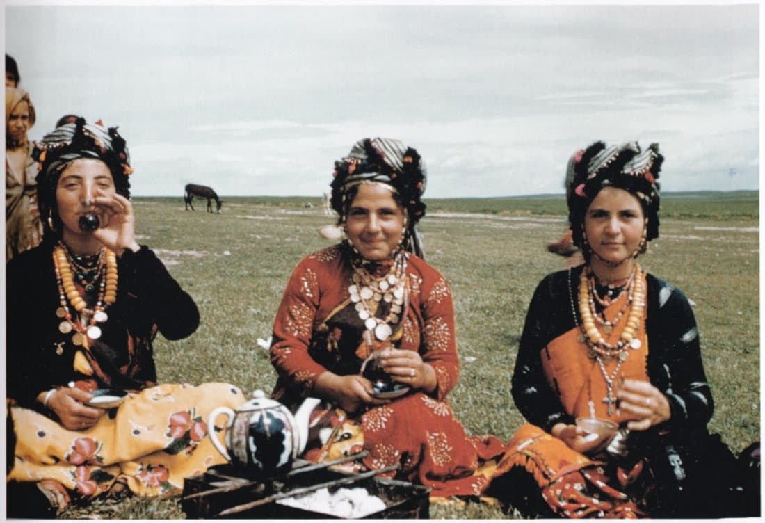 Three young women of Tesqopa drinking tea, about 1960