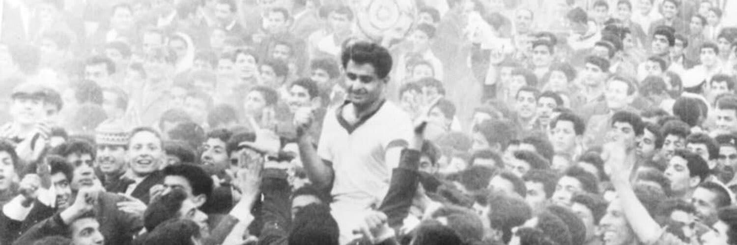 Ammo Baba carried by the crowd after a win in Baghdad, 1964