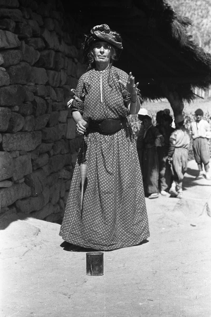 Assyrian woman spinning with a drop spindle in Challik, Barwar, 1951