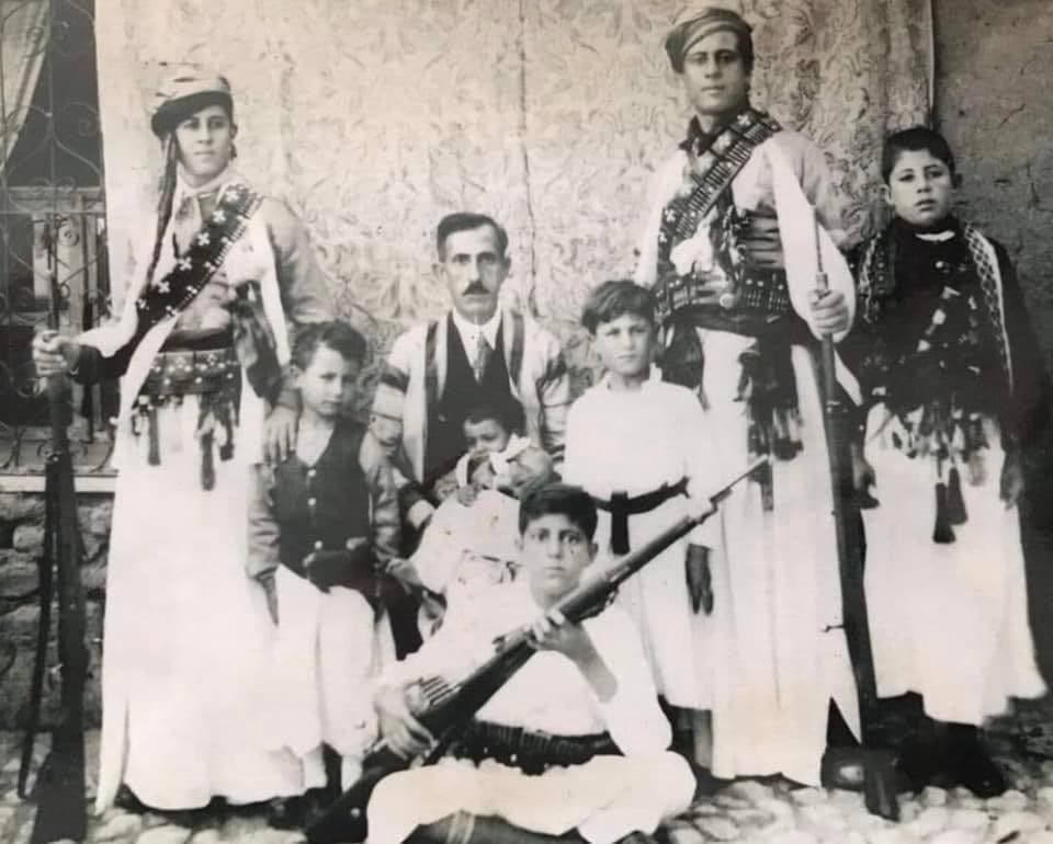 The Hanna family of Midyat, with rifles and bandoliers