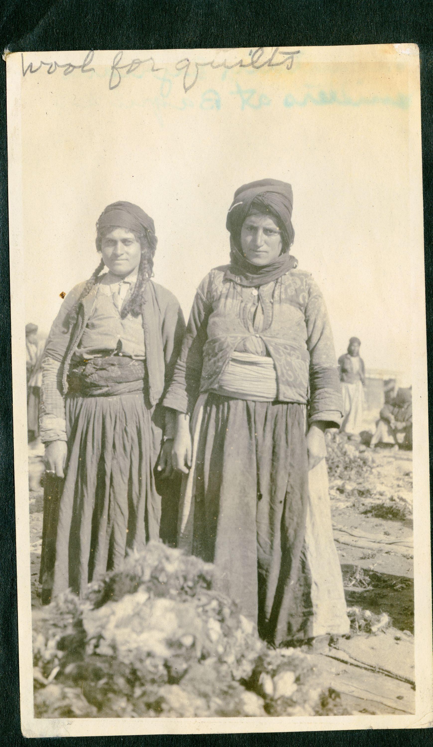 Refugee women with wool for quilts, Baqubah, 1919