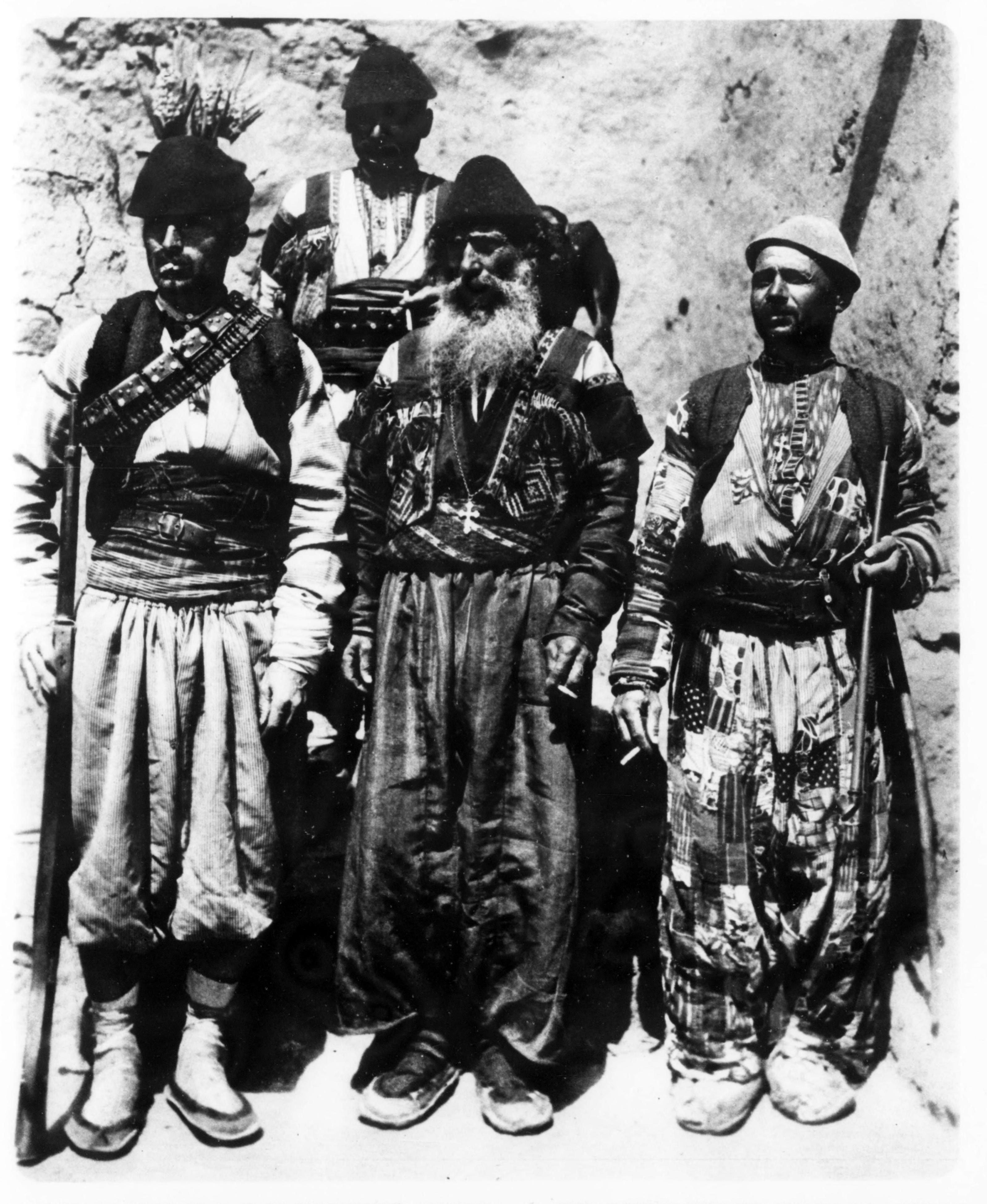 Assyrian bishop with two deacons and a servant, 1933