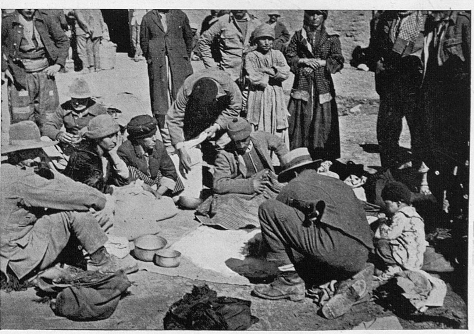 Assyrian refugees from Iraq receive food rations in Syria, 1936