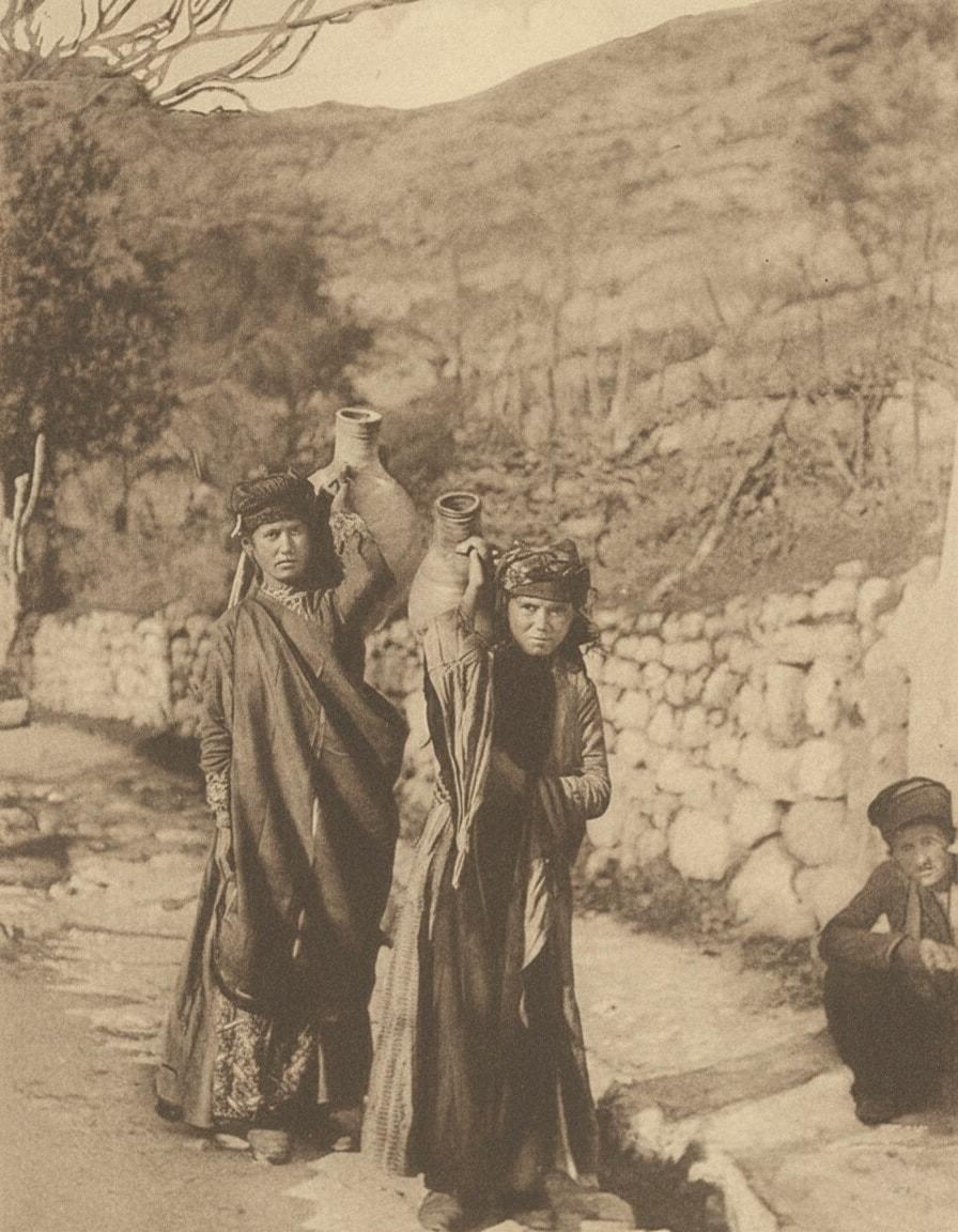 Girls carrying water jars near the church of Mor Yakub, Nusaybin, early 1900s