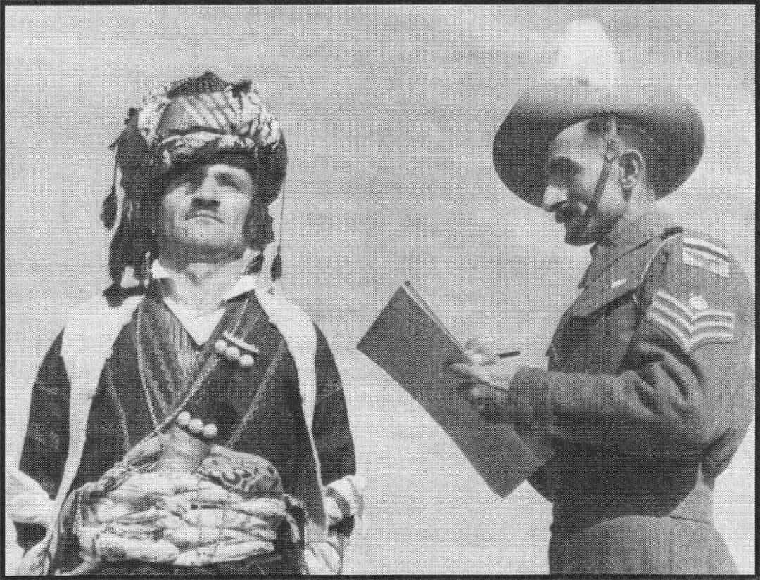 Flight Sgt Rehanna Cherry with an Assyrian Levy in native dress