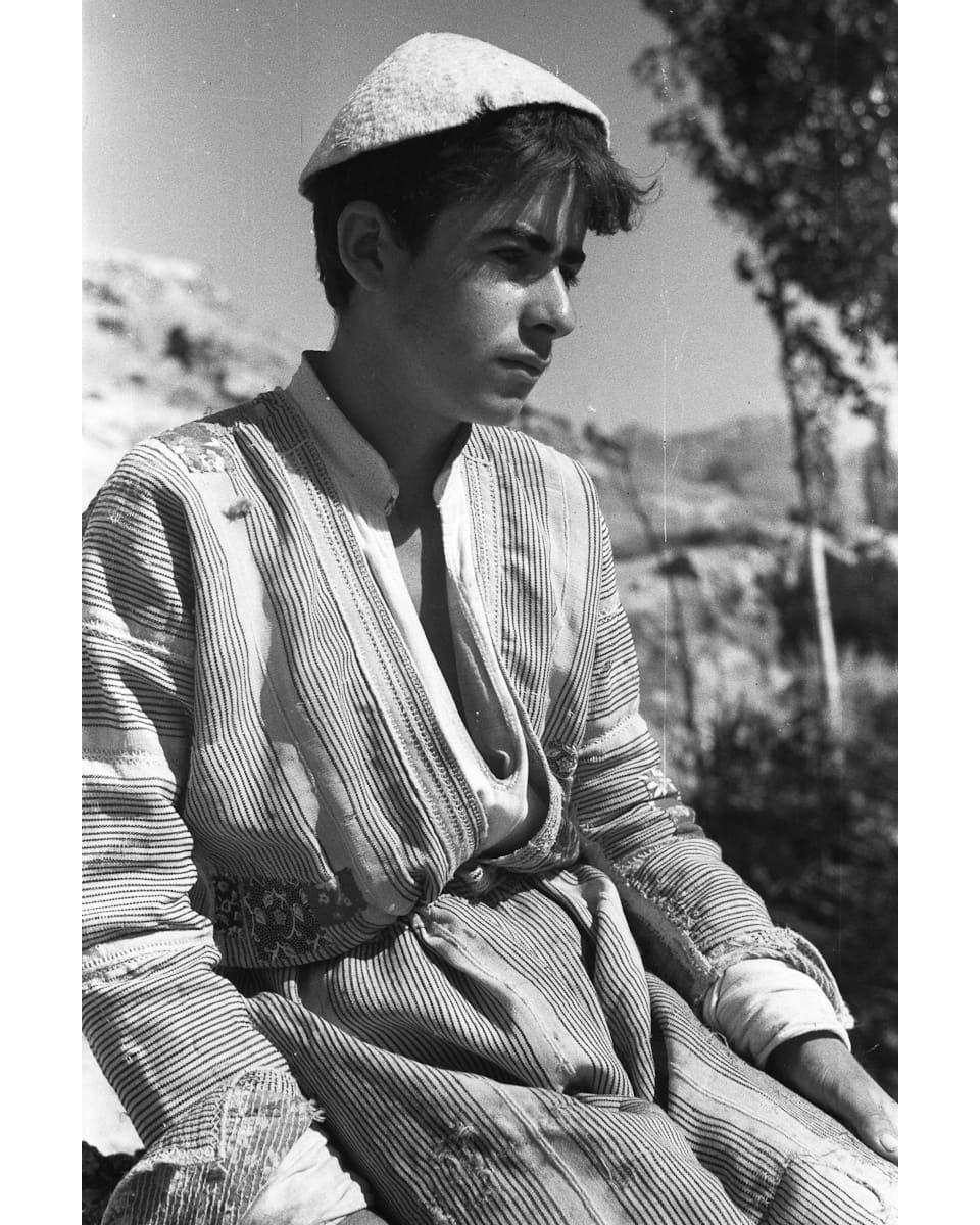 Assyrian youth seated at Challik