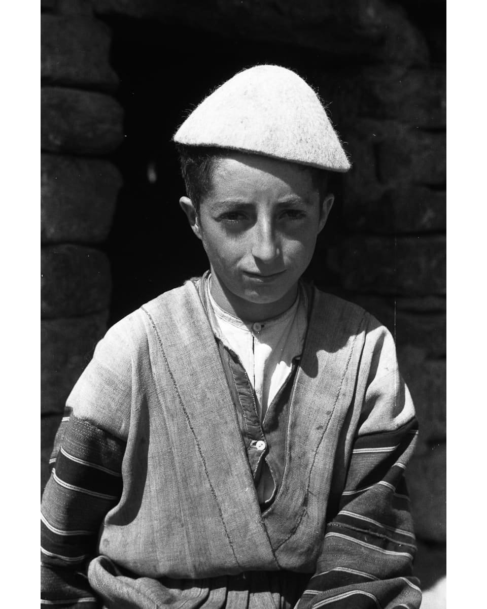 Assyrian boy in a felt cap