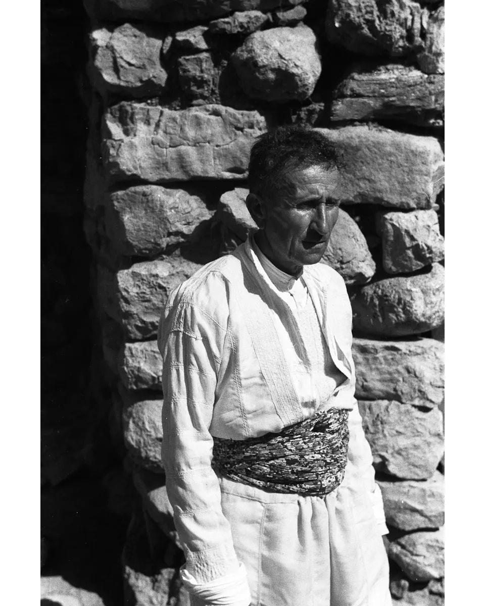 Assyrian man in white at Ain Nuni