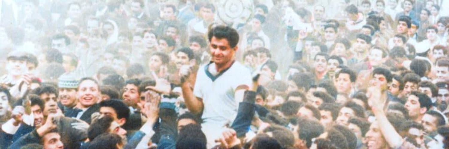 Ammo Baba carried by the crowd after a win in Baghdad, 1964