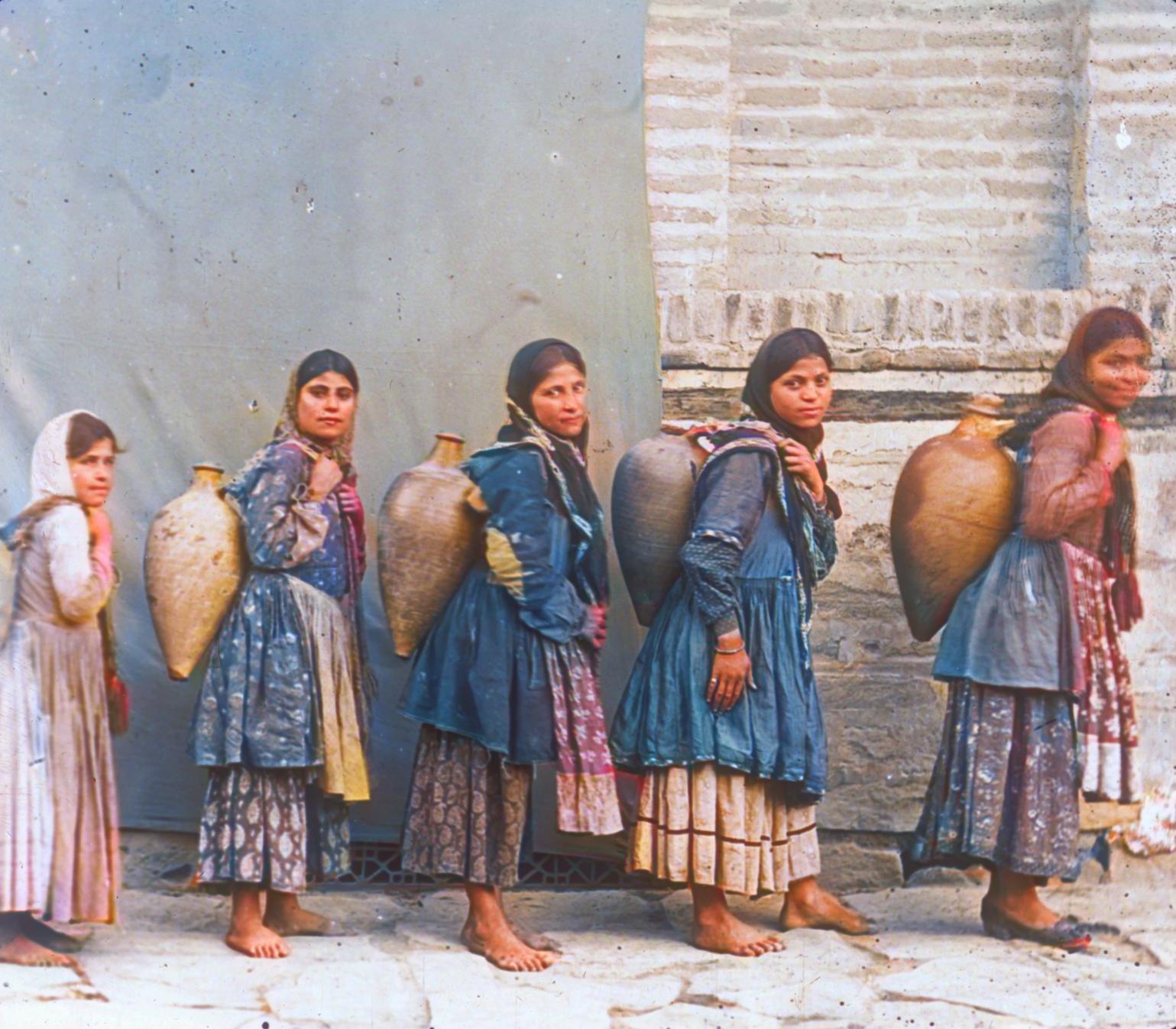 Nestorian (Assyrian) girls carrying water jars